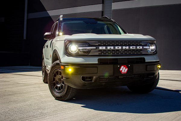 TotalZParts_Baja-Designs-S1-wide-cornering-fog-lights-kit-ford-bronco-amber_447683-installed-front-bumper